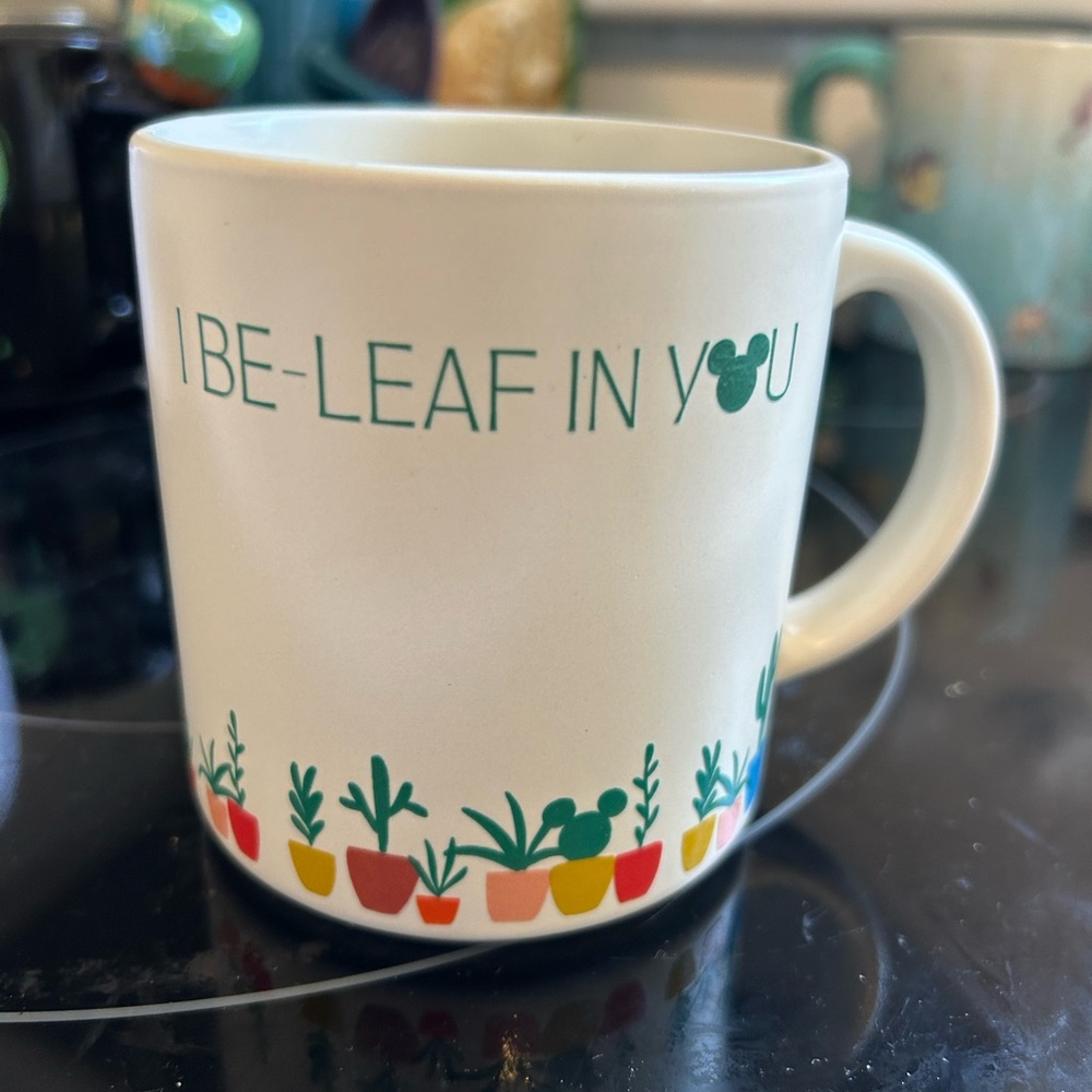 Disney White Mug with Green Lettering and Multicolor Plant Pots